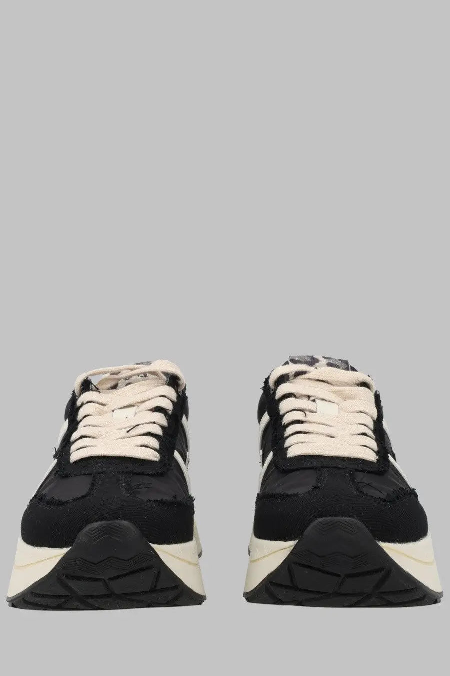 Premiata women’s sneaker Bethcoin black chunky sneaker with black and cream textured upper white laces and rubber soles