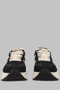 Premiata women’s sneaker Bethcoin black chunky sneaker with black and cream textured upper white laces and rubber soles