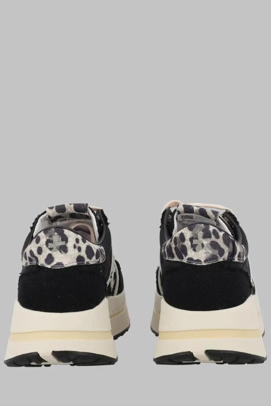 Premiata women’s sneaker Bethcoin black with black and white leopard print and chunky off-white sole