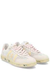 Premiata women’s sneaker Bonnied white with a perforated white and gold suede upper pink laces and rubber sole