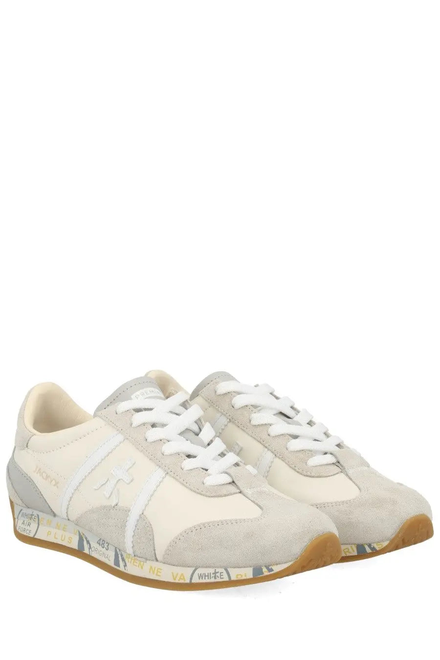 Premiata women’s sneaker jackyx 25d in beige and gray suede with white laces and a gum rubber sole with printed text