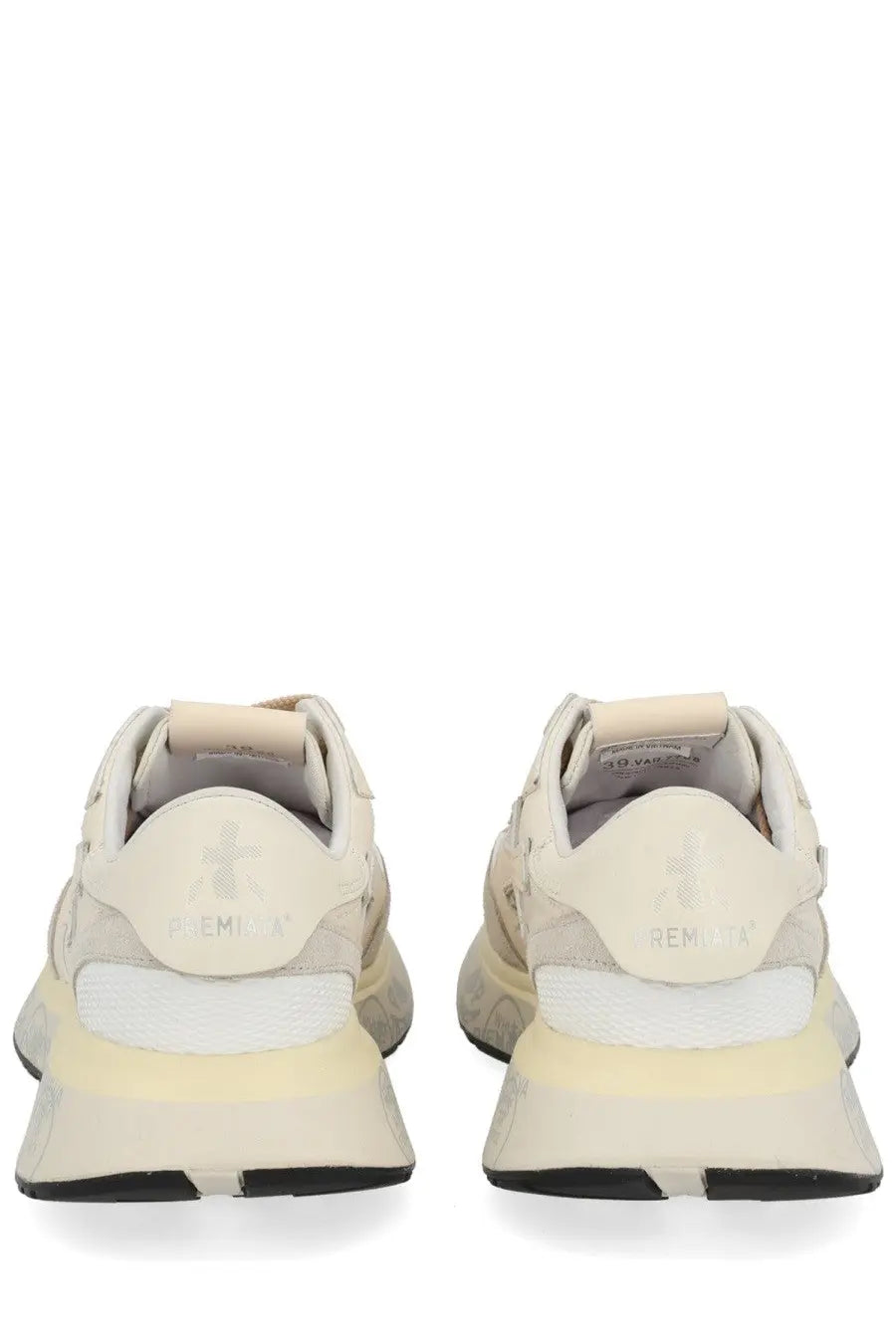 Back view of cream-colored chunky Premiata womens sneaker lauryn with white midsole black outsole and femmia heel branding