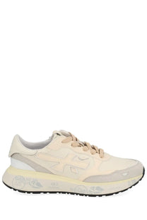 Premiata women’s Lauryn sneaker in cream with chunky sole gray accents and signature logo on the side