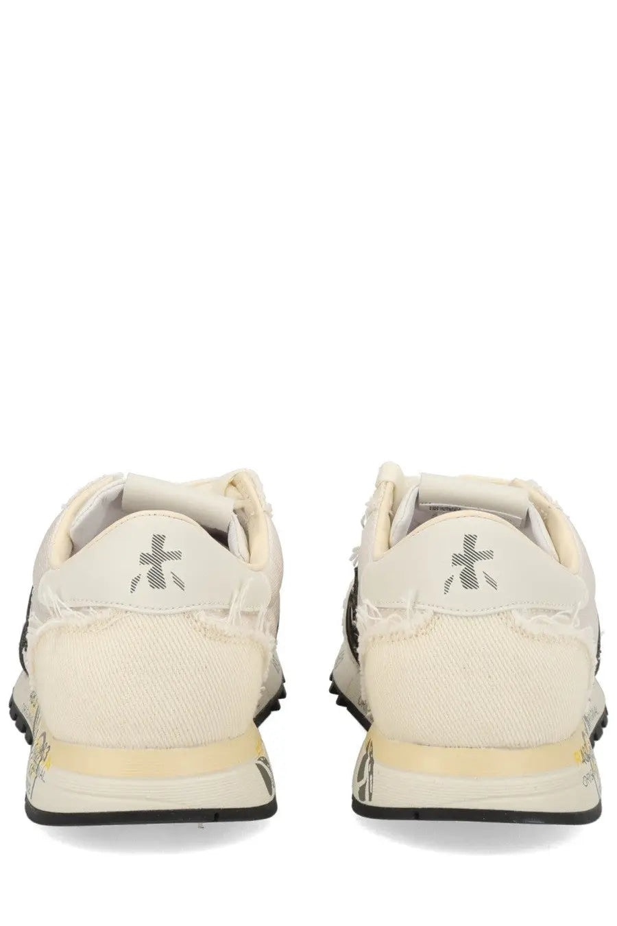 Premiata women’s sneaker lucy white cream-colored distressed canvas with black rubber sole and gray logo on the heel back side