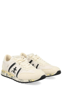 Premiata women’s sneaker lucy white cream sneakers with black and yellow graffiti graphics and white rubber sole