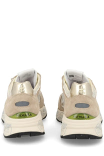Back view of cream-colored suede premiata women’s sneaker mased beige with metallic gold accents and green logo on heel