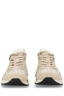 Beige suede and canvas high-top women’s sneakers with black rubber soles by Premiata model Mased beige