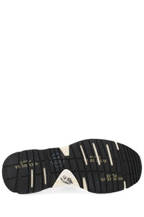Black rubber sole with white accents and riinneva plus branding on premieta womens sneaker mased white
