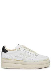 Premiata women’s sneaker micol white with distressed leather upper gold foil details black heel tab and off-white sole