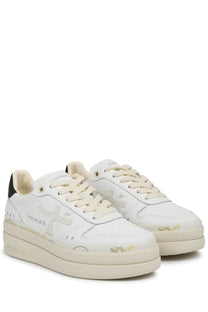Premiata women’s sneaker Micol white with cream laces black heel tabs and subtle gold foil branding on the sides