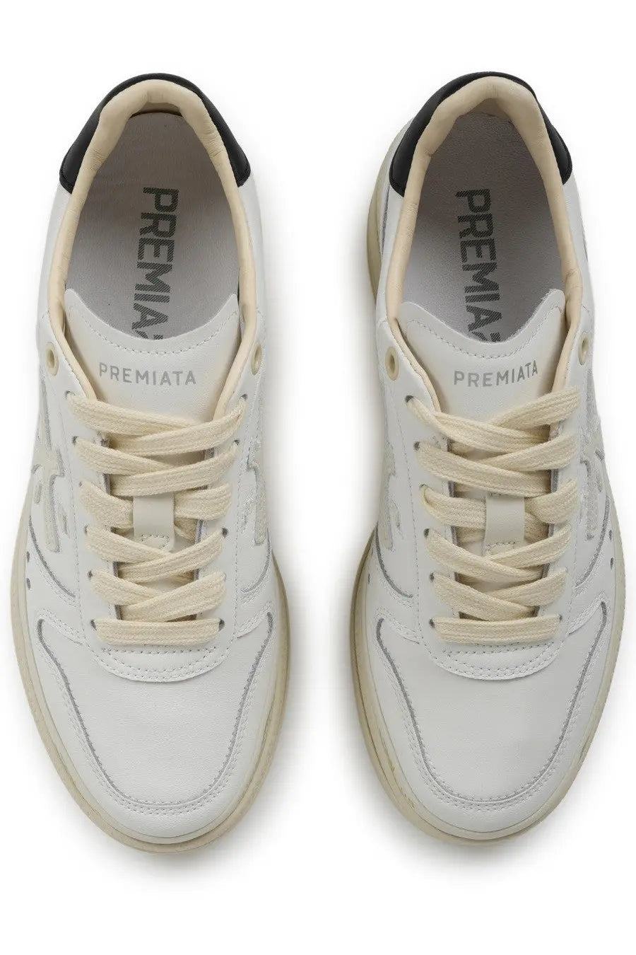 Premiata women’s sneaker micol white with cream laces and black heel accents showing the back side of the shoe