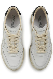 Premiata women’s sneaker micol white with cream laces and black heel accents showing the back side of the shoe