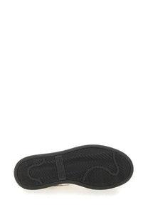 Black rubber sole with herringbone tread and embossed premier branding on premiata women’s sneaker quinnd pattern