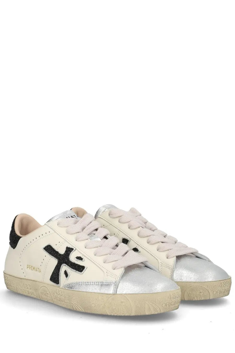 Premiata women’s sneaker Stevend white with cream-colored upper metallic silver toe cap and black embroidered logo