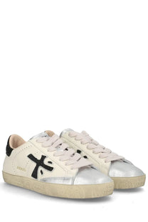 Premiata women’s sneaker Stevend white with cream-colored upper metallic silver toe cap and black embroidered logo