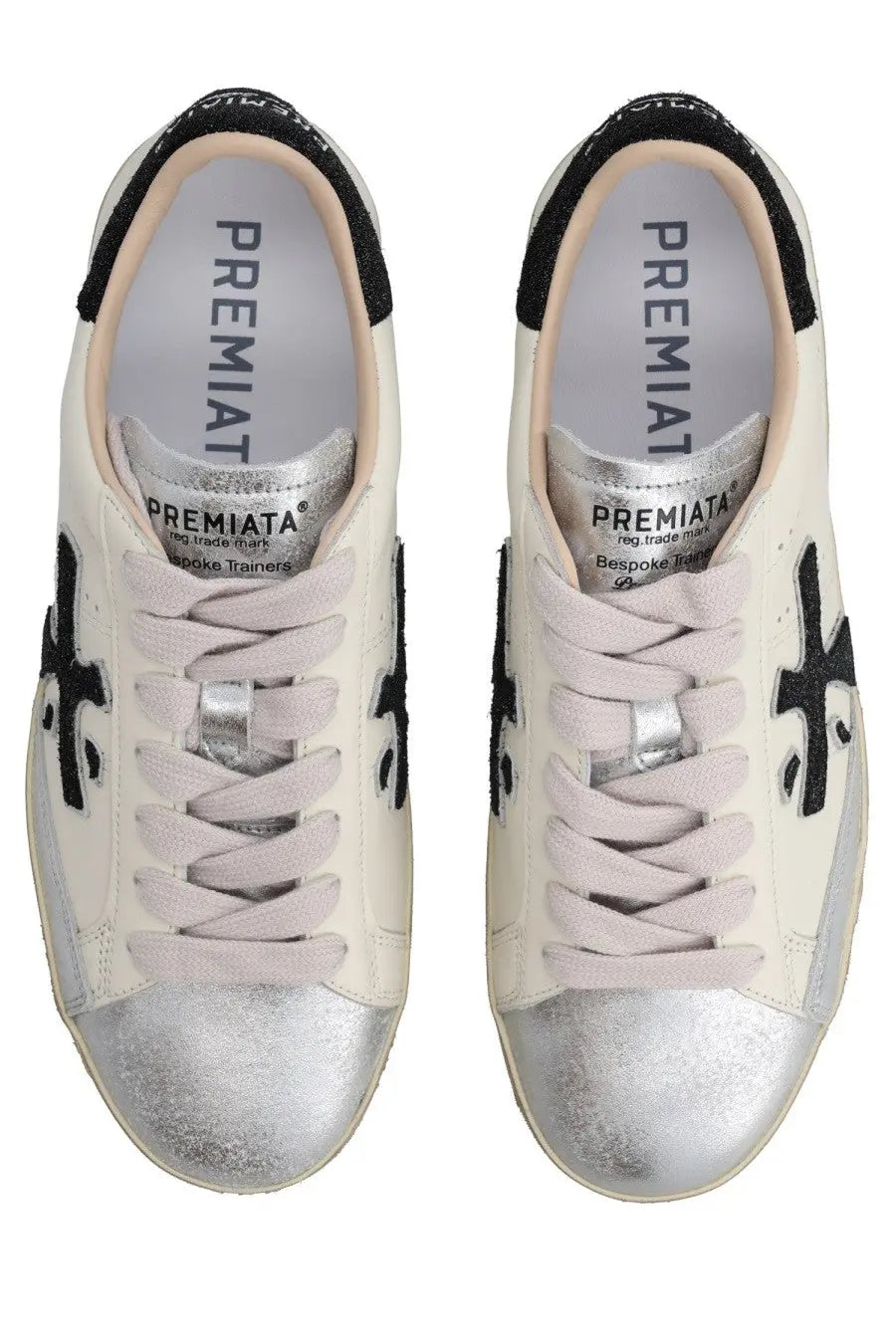 Premiata women’s sneaker Stevend white cream color with silver metallic toe caps and black embroidered crosses on sides