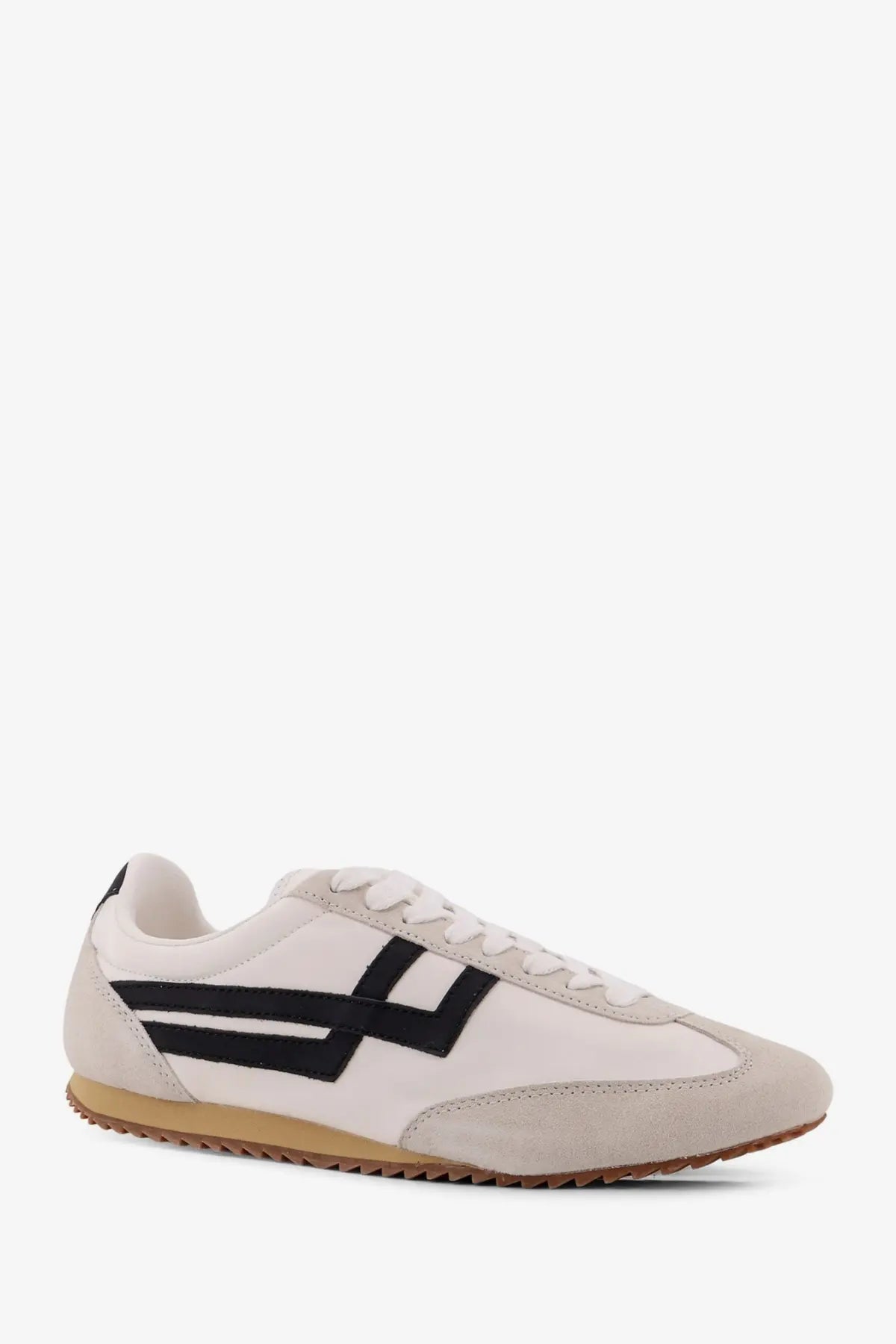 Pro-keds men’s racer leather sneakers in white with white suede and canvas, bold black stripes, and tan rubber sole