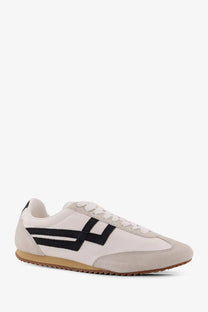 Pro-keds men’s racer leather sneakers in white with white suede and canvas, bold black stripes, and tan rubber sole