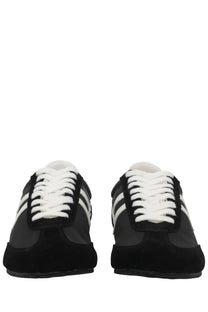 Pro-keds men’s reacer sneaker in black suede and synthetic leather with white laces and three iconic stripes