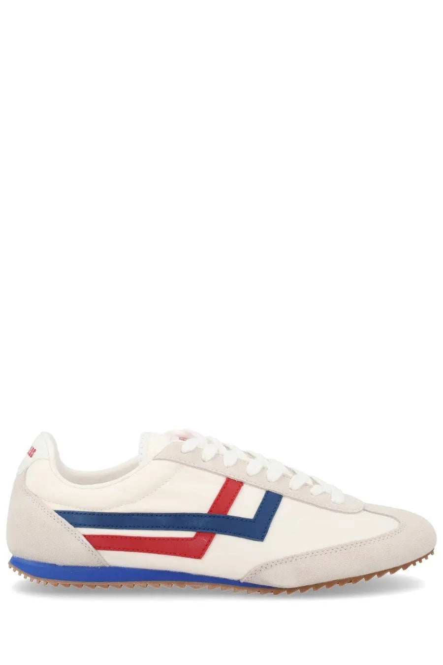 Pro-Keds men’s Reacer sneaker white canvas with bold red and blue side stripes and gum-colored rubber sole