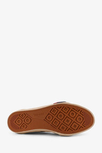 Tan rubber sole with geometric tread and pro-keds branding on pro-keds men’s royal classic suede sneakers black