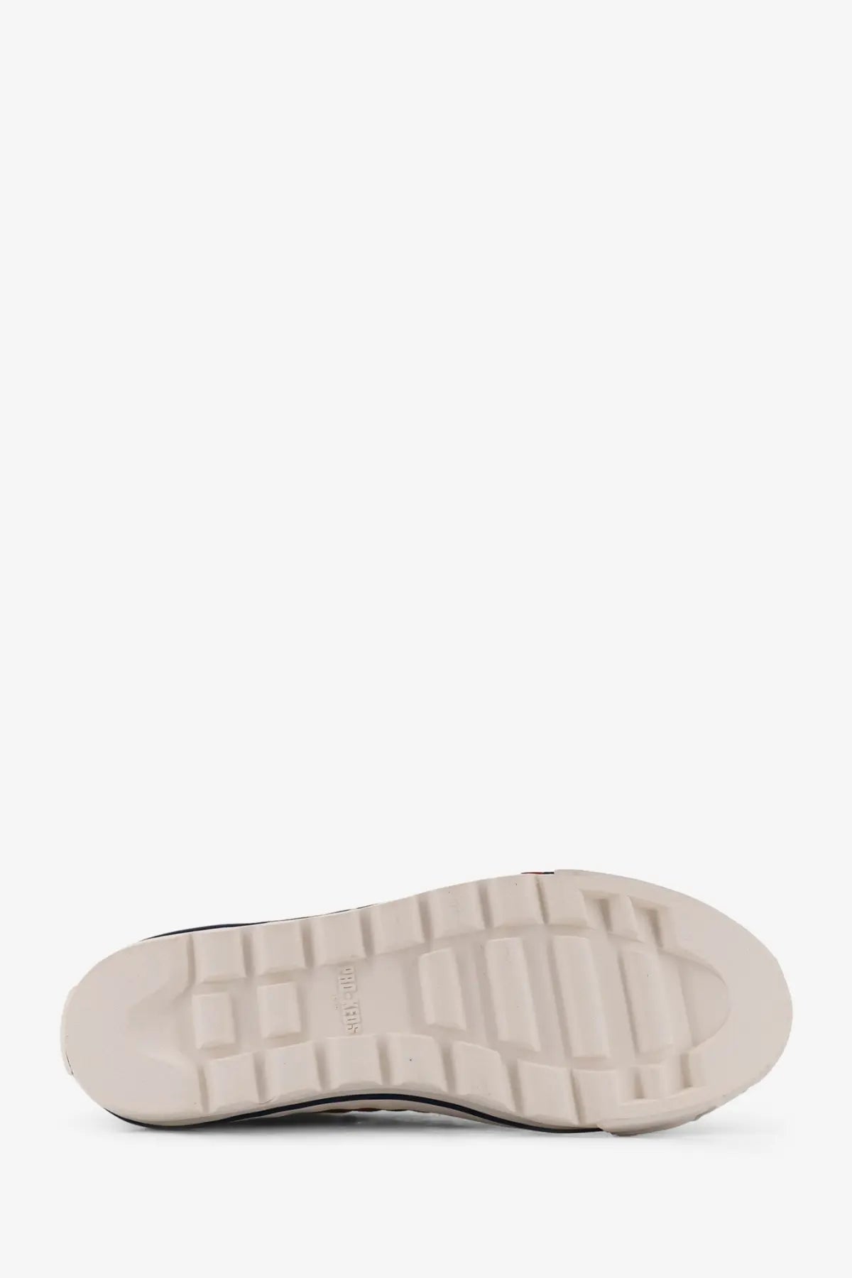 Cream-colored rubber sole with textured blocky tread and black sidewall detailing on pro-keds men’s royal intrepid canvas sneakers white