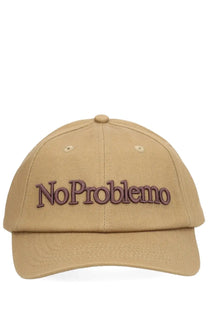 Tan cotton no problemo unisex baseball cap with dark brown embroidered lettering for casual wear