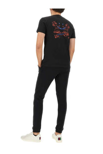 Back of ps by paul smith men’s black cotton t shirt with vibrant red and blue cartoon graphic design