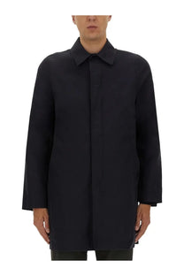 Black minimalist trench coat with structured collar and clean lines for men by ps by paul smith