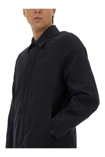 Black sleek men’s long-sleeved coat with structured collar and subtle seam detailing from ps by paul smith