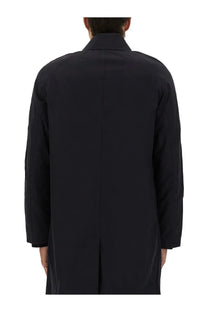 Black trench coat by ps by paul smith with structured collar lightweight waterproof blue material and minimalist design