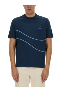 Navy blue short-sleeved ps by paul smith shirt with light blue wavy lines and embroidered smiley face logo on chest