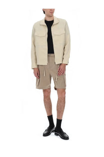 Beige utility jacket with two chest pockets and relaxed fit paired with ps by paul smith brown cotton cargo shorts