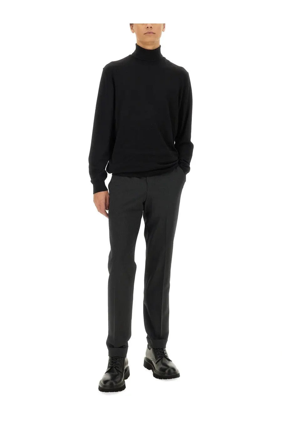 Black turtleneck sweater with a smooth fitted silhouette paired with pt torino men’s grey straight leg pants