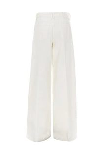 Cream-colored wide-leg tailored trousers with subtle waist pleats from Pt Torino women’s jeans Cindy White collection
