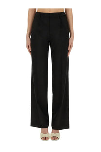 Pt Torino women’s pantalone Lola black high-waisted wide-leg trousers with a sleek tailored fit in black fabric