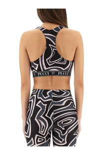 Black and white abstract patterned pucci sports bra with racerback design shown from the back for activewear use