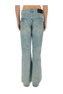 Purple Brand men’s coated flare jeans in light-wash denim with black leather belt loop at waistband in blue