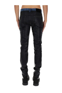 Black leather-look jeans with blue denim waistband from purple brand mens denim pants black product line front view