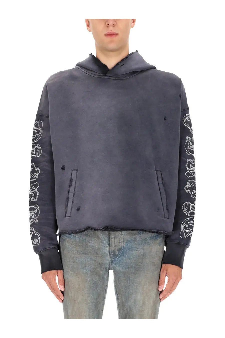 Dark gray purple brand men’s hoodie with white embroidered skull sleeves and distressed frayed hem visible from front