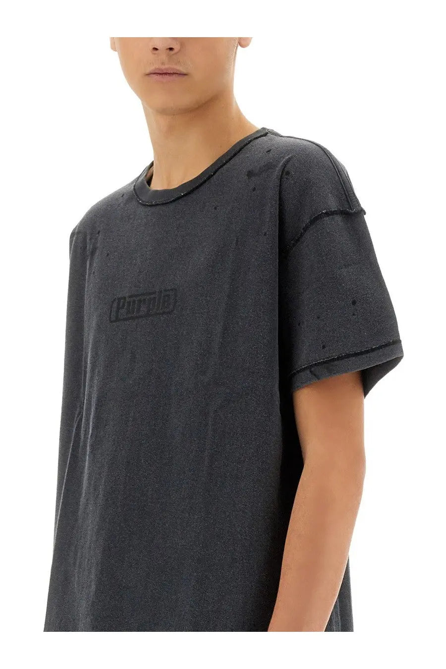 Purple Brand men’s inside out shirt black is a dark gray distressed cotton t-shirt with a subtle faded logo on the chest