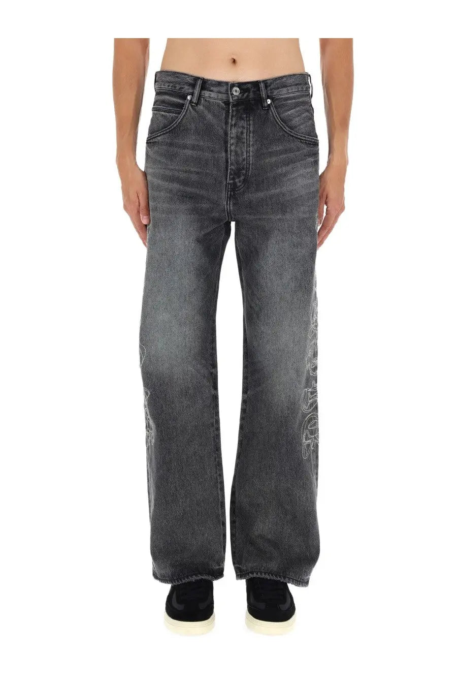 Purple Brand men’s wide-leg dark gray denim pants with subtle white embroidered designs and gothic wordmark detailing