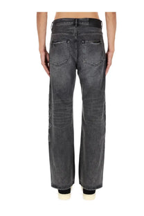 Purple brand men’s dark gray wide-leg denim jeans with faded wash and subtle embroidered details on outer leg