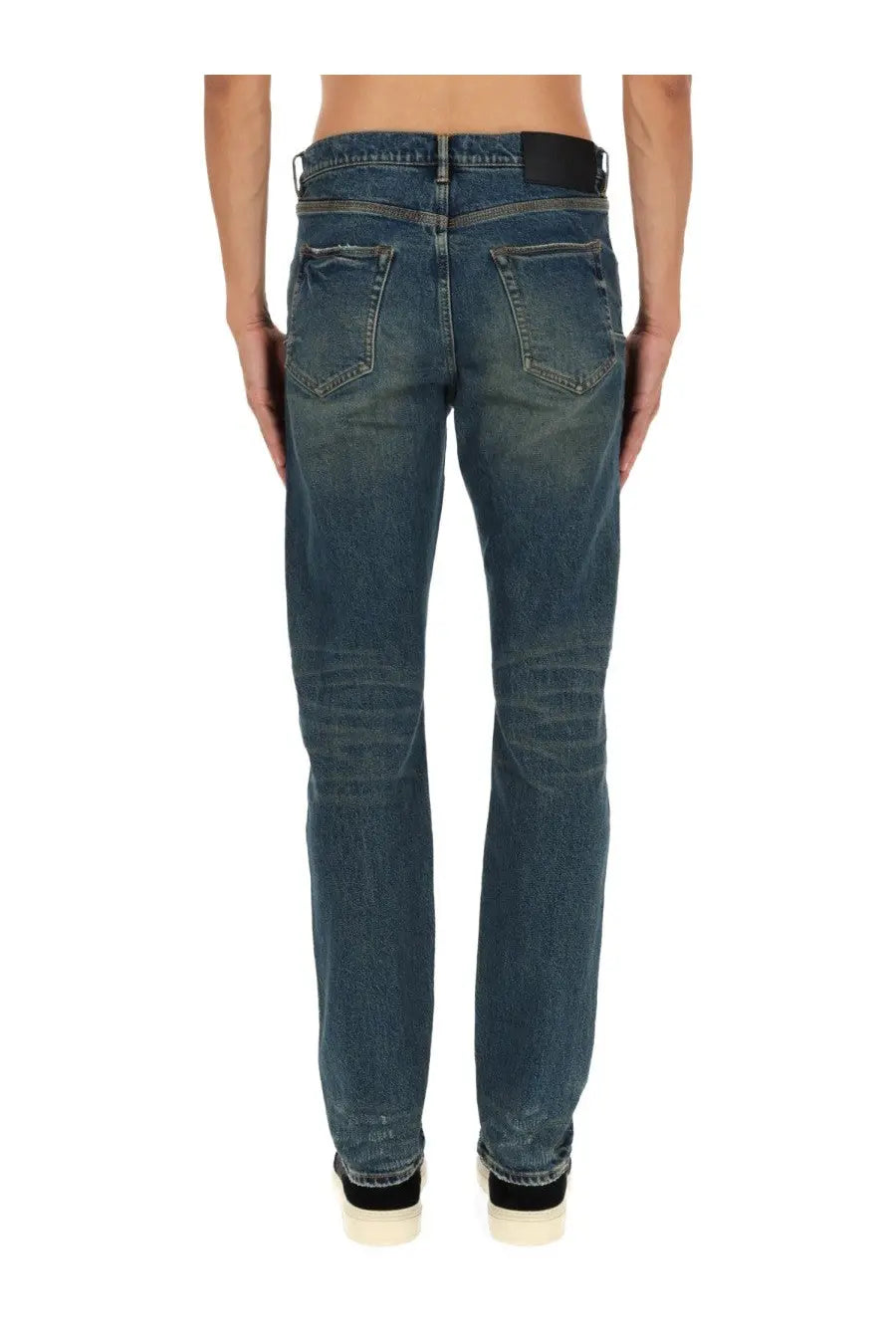 Purple brand men’s slim fit dark-wash denim jeans with straight-leg cut subtle fading classic back pockets and black waistband back view