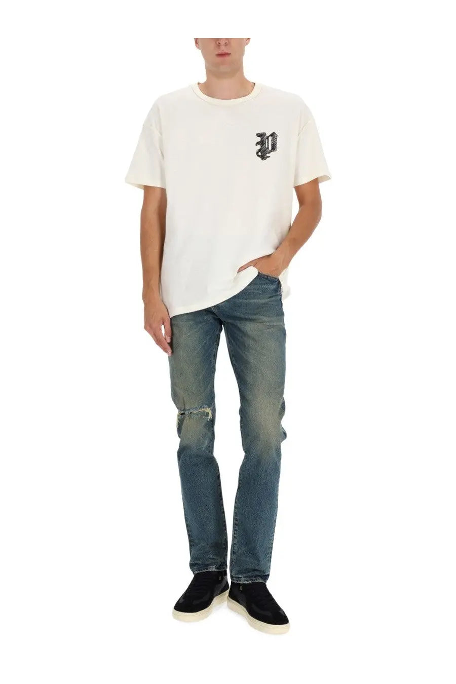 Off-white short-sleeved t-shirt with small black embroidered logo paired with purple brand men’s slim fit blue jeans