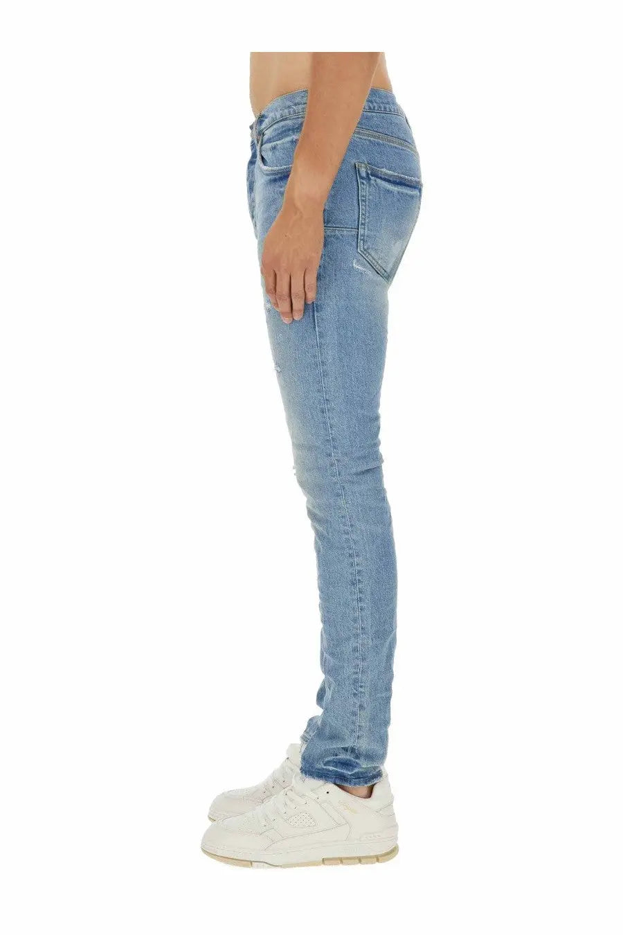 Purple brand men’s vintage abrasions light-wash denim jeans with slim fit and subtle distressing details in blue