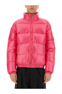 Vibrant pink puffer jacket with quilted design and elastic cuffs from Pyrenex unisex down jacket vintage mythic blue collection