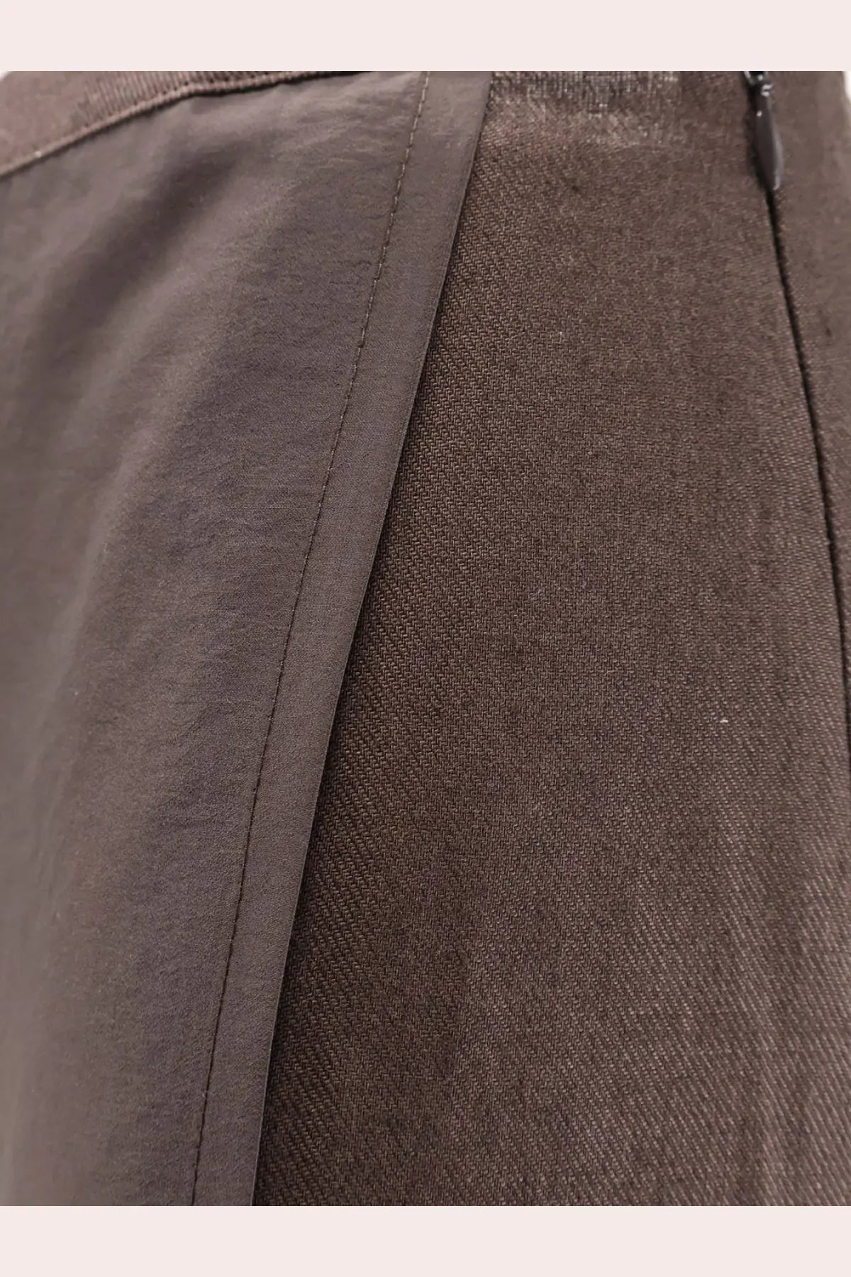 R2W women’s amora linen skirt brown made of dark brown woven fabric with subtle texture and visible seam stitching