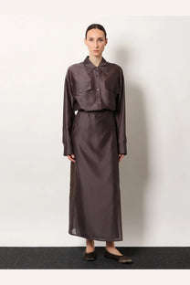 R2W women’s amora linen skirt brown with a sleek dark brown satin button-up shirt and high-waisted midi skirt set
