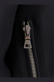 Silver-toned zipper pull with p2w engraving on r2w women’s julio black wool and silk jacket